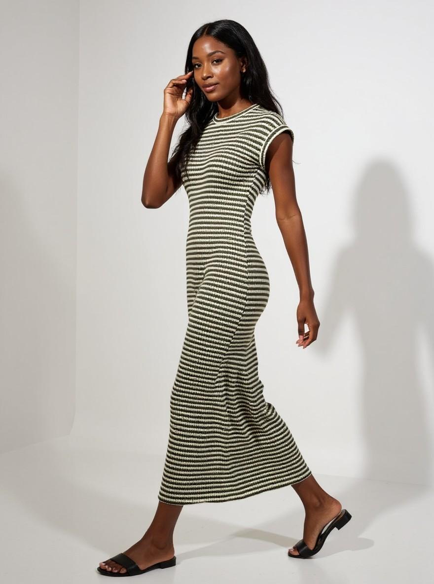 The Stripe Maxi in Khaki, side view, walking