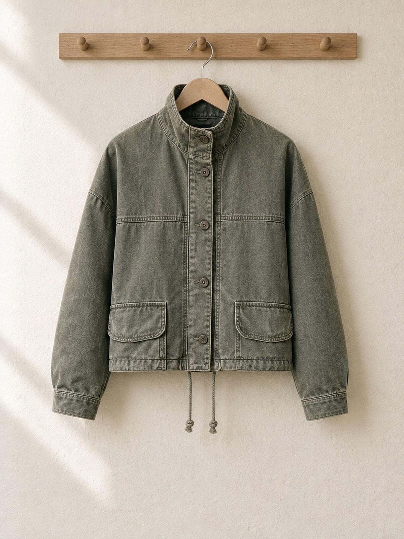 The Utility Jacket in Khaki, on the hanger