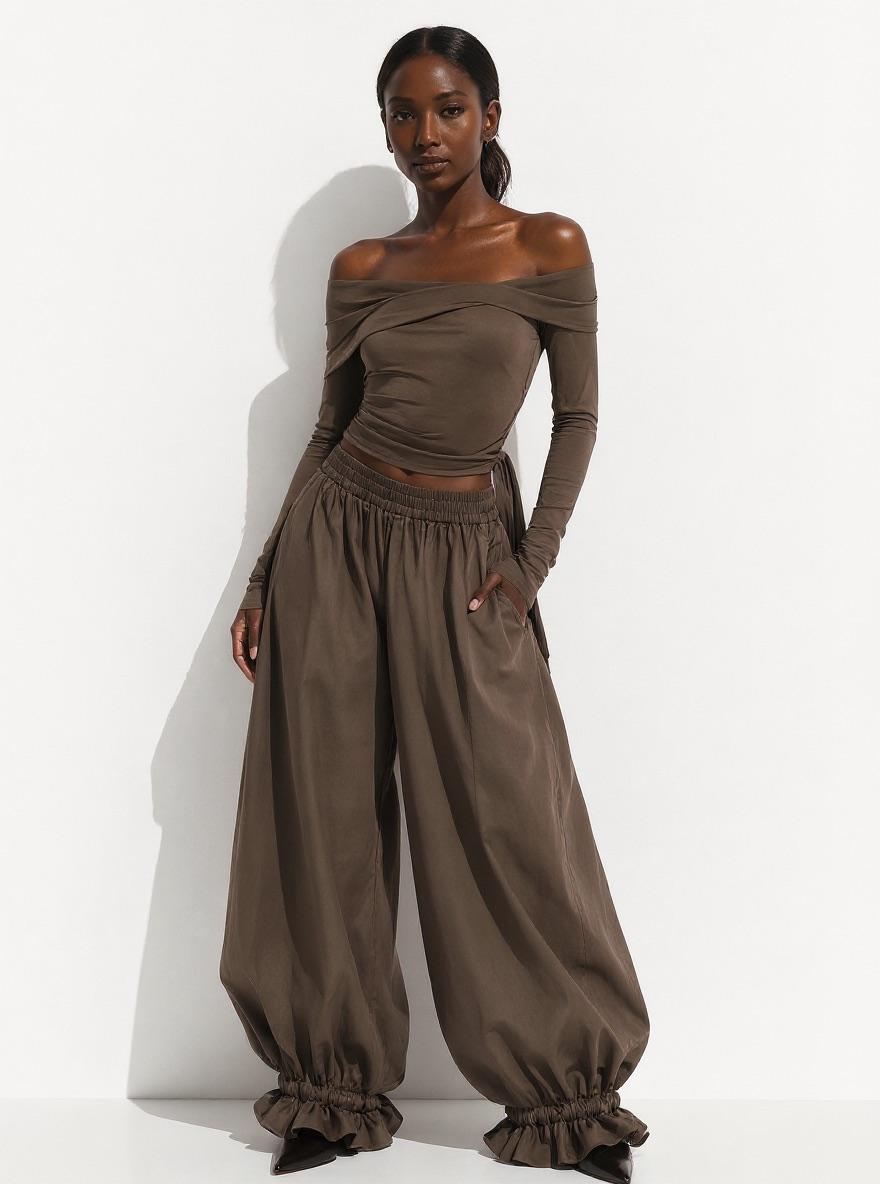 Woman wearing The Parachute Trouser in brown
